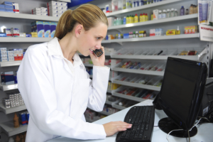 pharmacist talking to patients on the phone